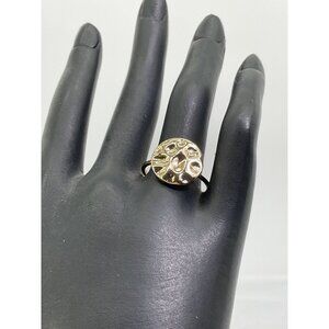 Gold Tone Ring With Abstract Round Design